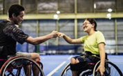 Teammates fistbumping during a basketball game