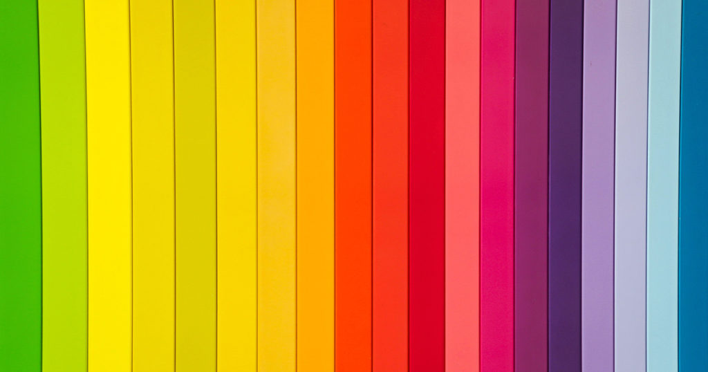 Rainbow of brightly colored paper